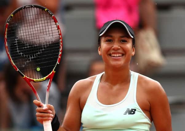 Heather Watson celebrates her win over Oceane Dodin of France at Roland Garros. Picture: Clive Brunskill/Getty Images
