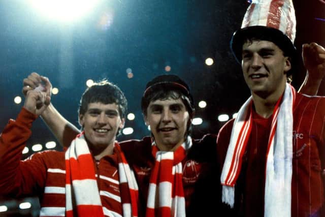 Eric Black, John Hewitt and Neale Cooper in party mood after Aberdeen's 2-1 win over Real Madrid in the European Cup Winners' Cup final in 1983. Picture: SNS Group