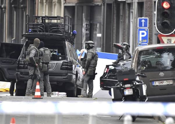Belgian Special Police at the scene of a shooting in Liege. Picture: AP