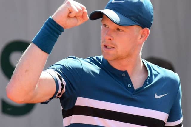 British No 1 Kyle Edmund celebrates after winning a point during his first-round victory over Australian teenager Alex De Minaur. Picture Christophe Archambault/AFP/Getty Images