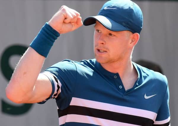 British No 1 Kyle Edmund celebrates after winning a point during his first-round victory over Australian teenager Alex De Minaur. Picture Christophe Archambault/AFP/Getty Images