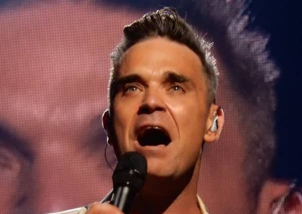 Angels singer Robbie Williams is locked in a feud with neighbour Jimmy Page