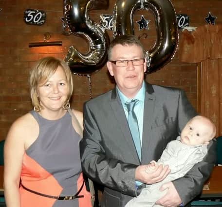Diver Lex Warner pictured on his 50th birthday with his wife Debbie and their son Vincent. Mr Warner suffered serious internal injuries in a fall on a chartered vessel during a dive off Cape Wrath