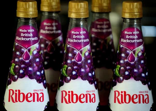 Blackcurrant-based hair dyes which use waste from the production of Ribena have been created by scientists. Picture: PA Wire