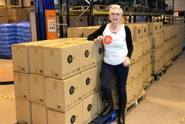 Hey Girls founder Celia Hodson in the social enterprise's warehouse