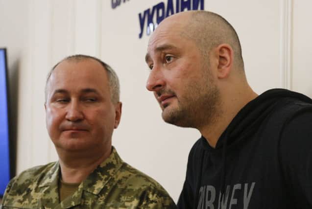Russian journalist Arkady Babchenko, right, and Vasily Gritsak, head of the Ukrainian Security Service speaks to the media during a news conference at the Ukrainian Security Service. Picture: Efrem Lukatsky