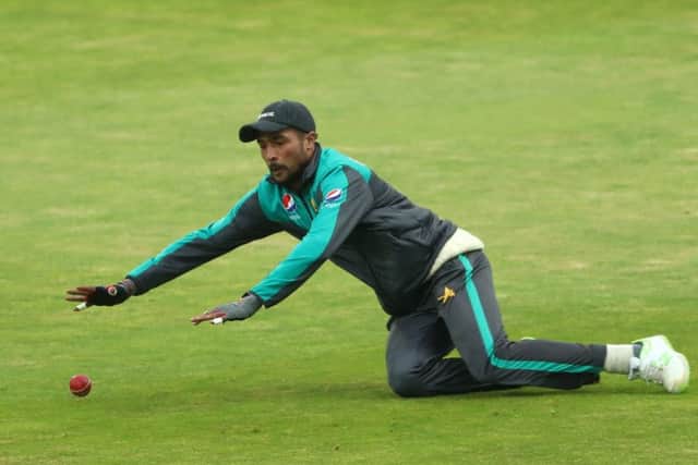 Mohammad Amir takes part in a fielding drill at Headingley. Picture: Tim Goode/PA