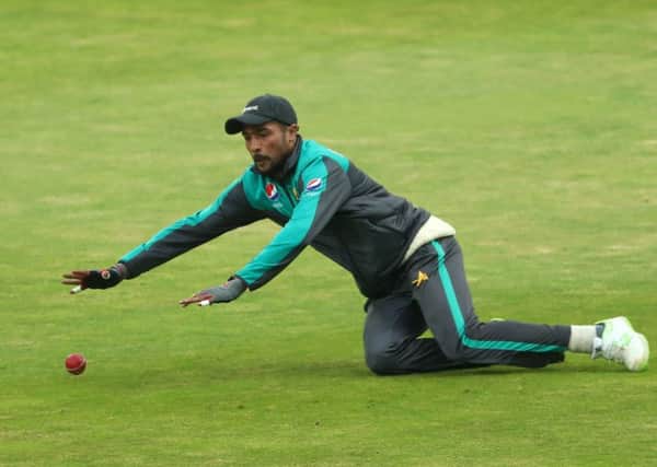 Mohammad Amir takes part in a fielding drill at Headingley. Picture: Tim Goode/PA