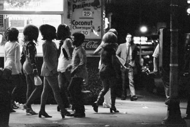 Prostitutes working along the side streets of Broadway and Times Square in New York in 1971. Picture: Bettmann Archive