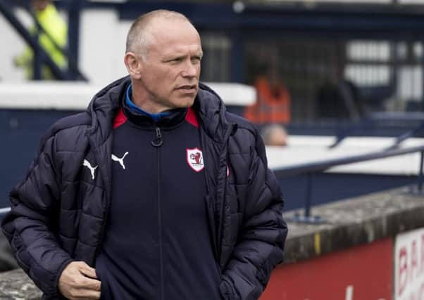 John Hughes failed to save the club from relegation. Picture: SNS