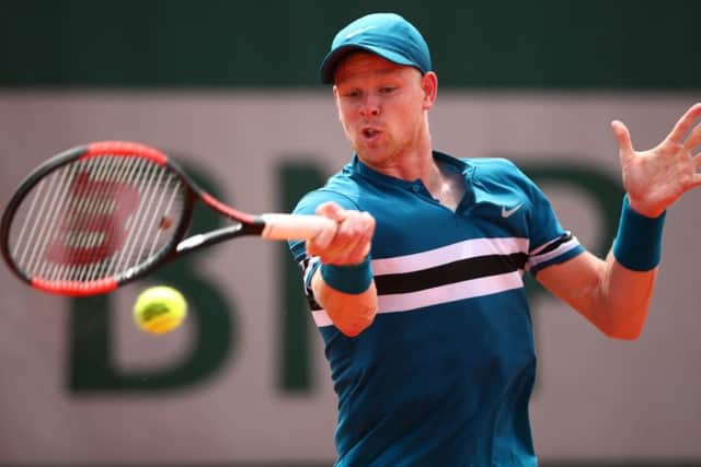 Kyle Edmund plays a forehand during his win over Marton Fucsovics at Roland Garros. Picture: Clive Brunskill/Getty Images
