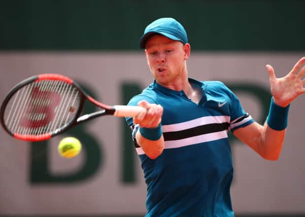 Kyle Edmund plays a forehand during his win over Marton Fucsovics at Roland Garros. Picture: Clive Brunskill/Getty Images