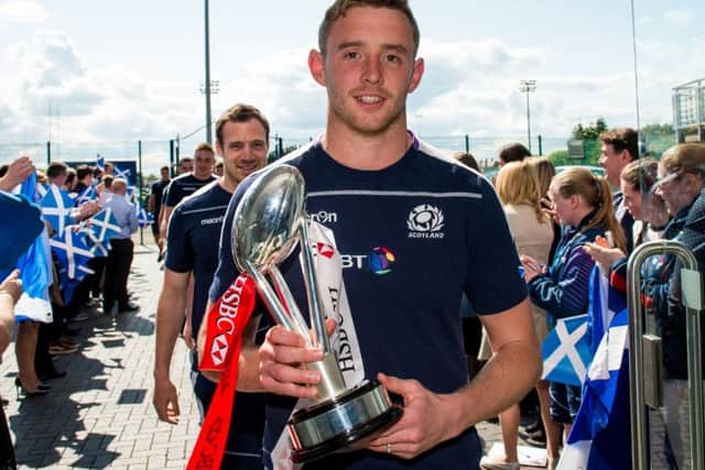 Scott Wight with the Twickenham 7s trophy as the squad returned to Murrayfield. Picture: Ross Parker/SNS/SRU