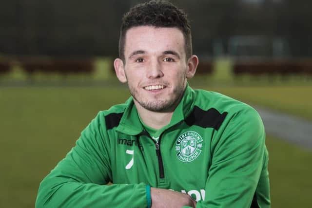 John McGinn says he's loving life at Hibs despite speculation linking him with other clubs. Picture: Paul Devlin/SNS
