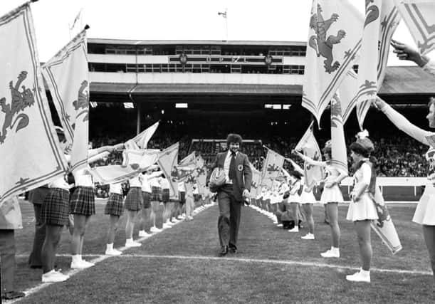 Scotland World Cup team player Derek Johnstone with majorettes at Hampden Park before the team go to Argentina in May 1978