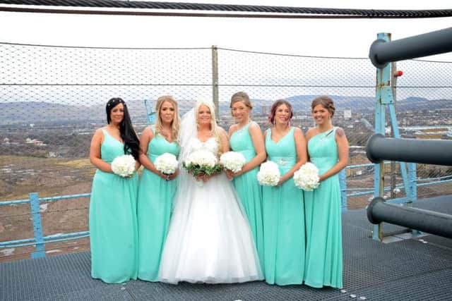 Kate Elliot with her bridemaid's. Picture: SWNS