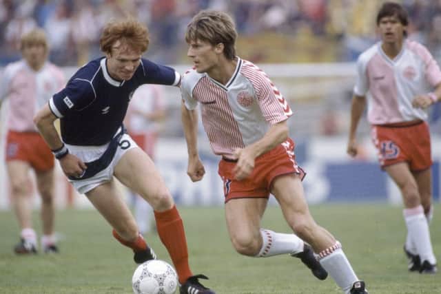 Alex McLeish battles with Denmark striker Michael Laudrup during Scotlands opening game of the 1986 World Cup finals in Mexico. Picture: Getty.