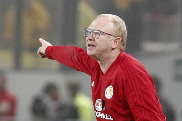 Alex McLeish issues instructions in the game against Peru