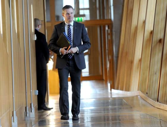 Finance Secretary Derek Mackay delivers his statement regarding business rates/income tax at Scottish Parliament