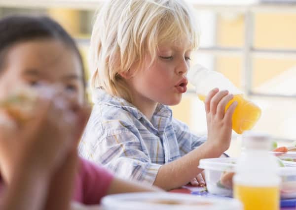 Fruit juices will no longer be seen on lunch menus in Scottish schools under government plans. Picture: Getty