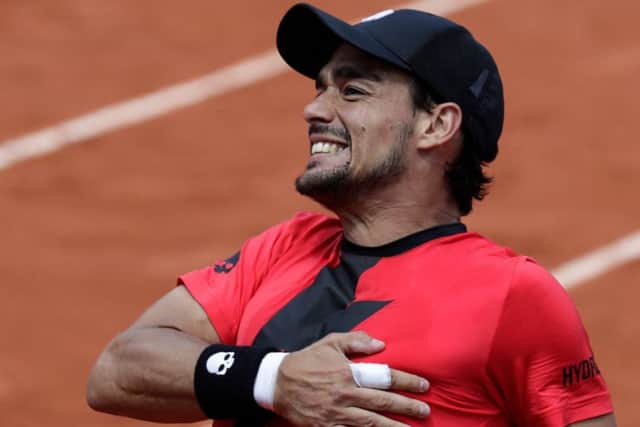 Italys Fabio Fognini celebrates after victory over Britains Kyle Edmund in Paris.  Photograph: Thomas Samson/AFP/Getty Images