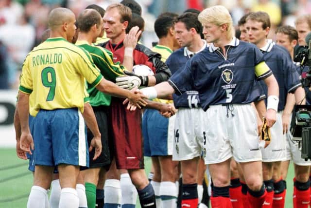 Colin Hendry shakes hands with Ronaldo before the start of the opening match of the France 98 World Cup. Picture: TSPL.
