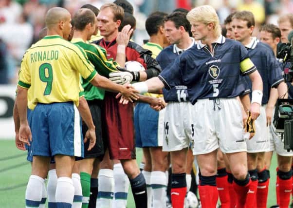 Colin Hendry shakes hands with Ronaldo before the start of the opening match of the France 98 World Cup. Picture: TSPL.