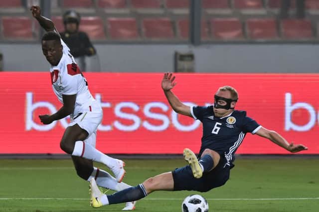 Dylan McGeouch won his first cap for Scotland against Peru last week. Picture: AFP/Getty.