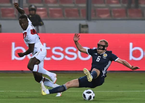 Dylan McGeouch won his first cap for Scotland against Peru last week. Picture: AFP/Getty.