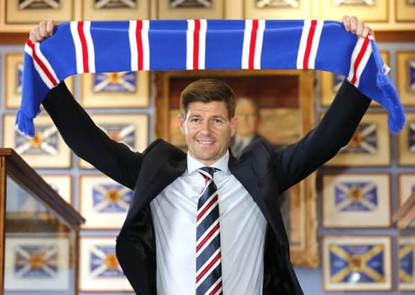 Steven Gerrard met some of his Rangers players while on holiday. Picture: PA.