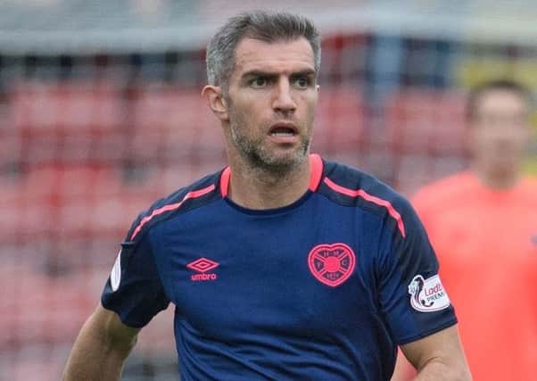 Aaron Hughes is still weighing up his future