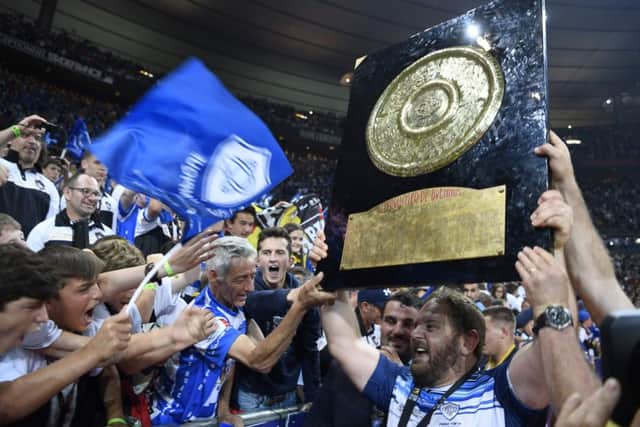 Prop Daniel Kotze  holds the Bouclier de Brennus trophy as he celebrates Castres victory. Picture: AFP/Getty