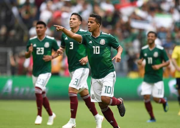 Giovani Dos Santos celebrates his goal for Mexico. Picture: AFP/Getty.
