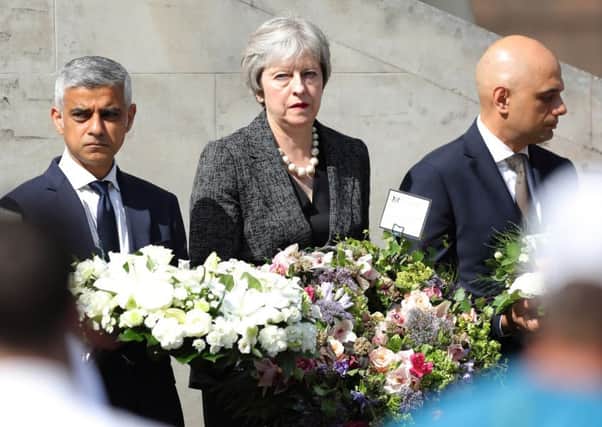 Mayor of London Sadiq Khan, Prime Minister Theresa May and Home Secretary Sajid Javid mark one year since the terror attack on London Bridge and Borough, Picture: Andrew Matthews/PA Wire