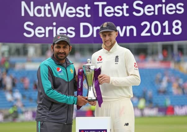 Joe Root, right, alongside Pakistan captain Sarfraz Ahmed after the drawn NatWest Test series. Picture: PA.