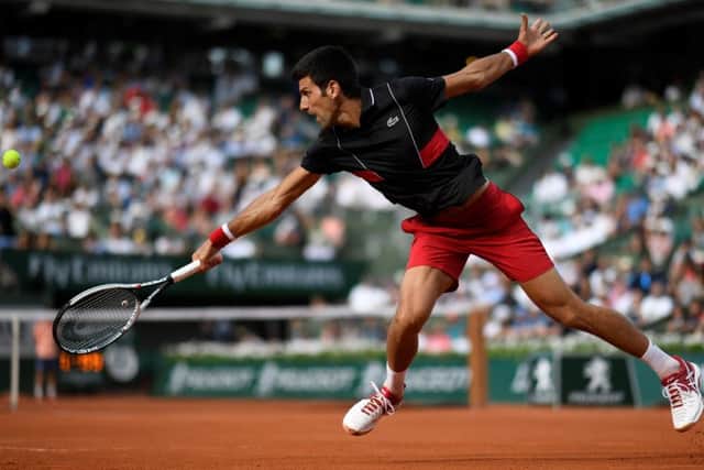 Novak Djokovic plays a backhand return during his win over Fernando Verdasco. Picture: AFP/Getty