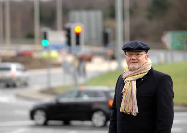 Colin Beattie MSP at Sheriffhall roundabout.