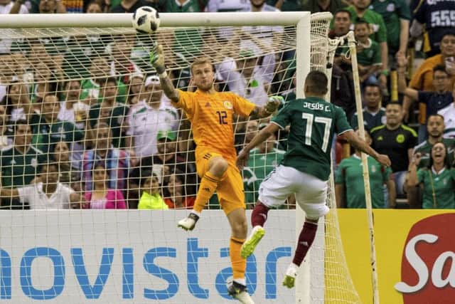 Scott Bain made a string of saves in Scotlands 1-0 defeat by Mexico. Picture: SNS.