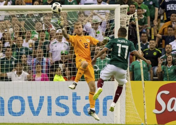 Scott Bain made a string of saves in Scotlands 1-0 defeat by Mexico. Picture: SNS.