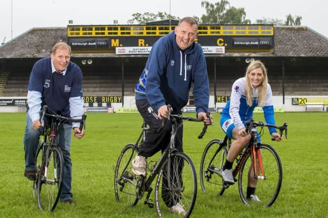 Doddie Weir is flanked by former rugby rival Peter Winterbottom and Scottish paralympic tandem cyclist Louise Haston at the Greenyards. Picture: Craig Watson