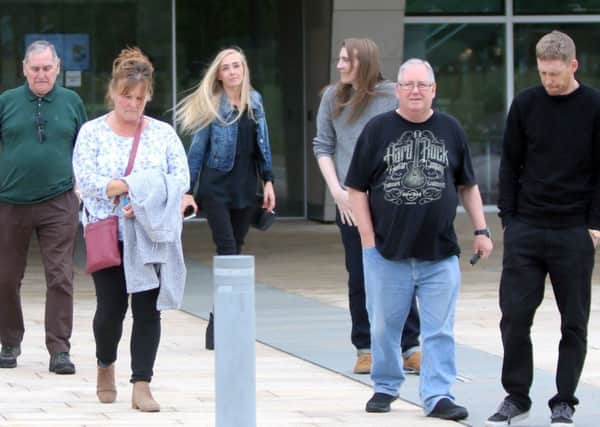 Members of Craig McLellands grieving family leaving the High Court at Livingston after seeing his killer jailed for life. (Picture: Vic Rodrick)