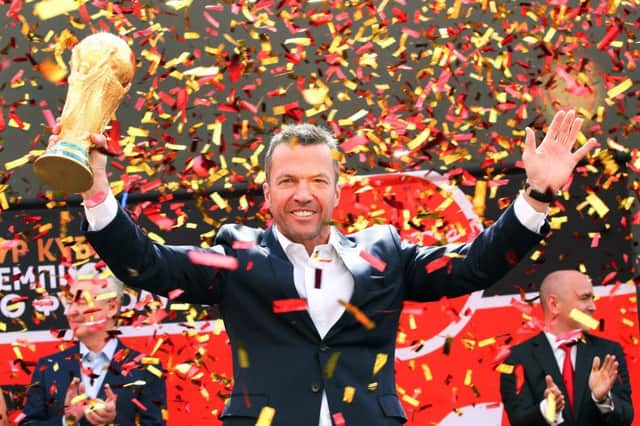 German football legend Lothar Matthaus attends a ceremony to welcome the FIFA World Cup trophy at Manezh Square in Moscow, Russia. Picture: Moscow News Agency/AP