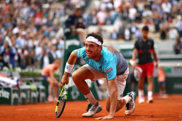 Unseeded Italian Marco Cecchinato celebrates his stunning quarter-final victory over Novak Djokovic. Picture: Getty.