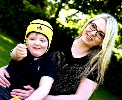 Muray, 5 with his mum Karen. Picture: Lisa Ferguson.