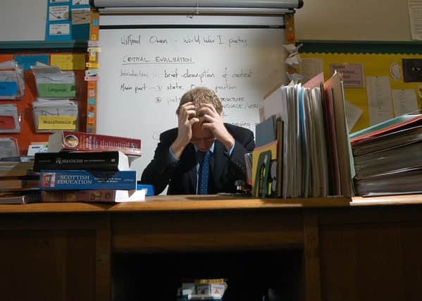 One teacher surveyed commented that the amount of paperwork was unbelievable. Picture: TSPL
