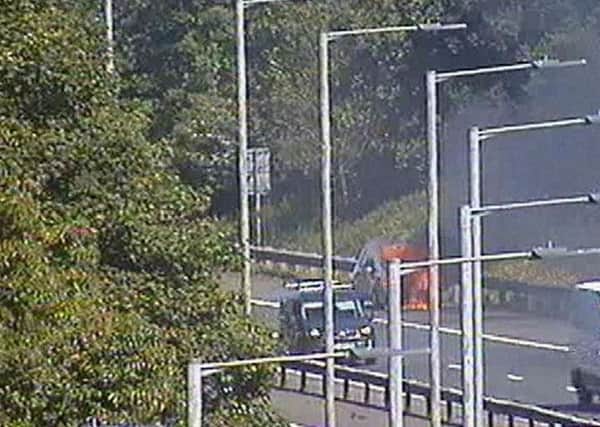 A vehicle on fire on the M8. Picture: Traffic Scotland