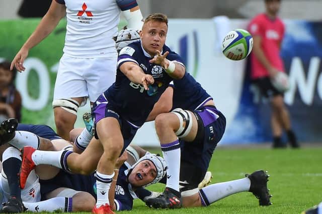 Scotland's Charlie Gowling passes the ball during the rugby U20 world championship match against England in Beziers. Picture: Sylvain Thomas/AFP/Getty Images