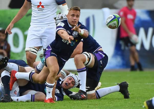 Scotland's Charlie Gowling passes the ball during the rugby U20 world championship match against England in Beziers. Picture: Sylvain Thomas/AFP/Getty Images