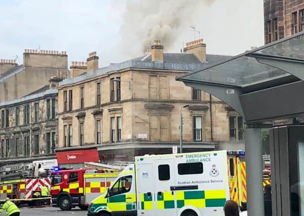 Emergency services at the scene of blaze on Byres Road. Picture: Fiona Leverick
