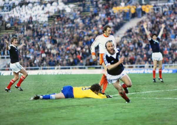 Archie Gemmill celebrates his solo goal against Holland. Photograph: REX/Shutterstock